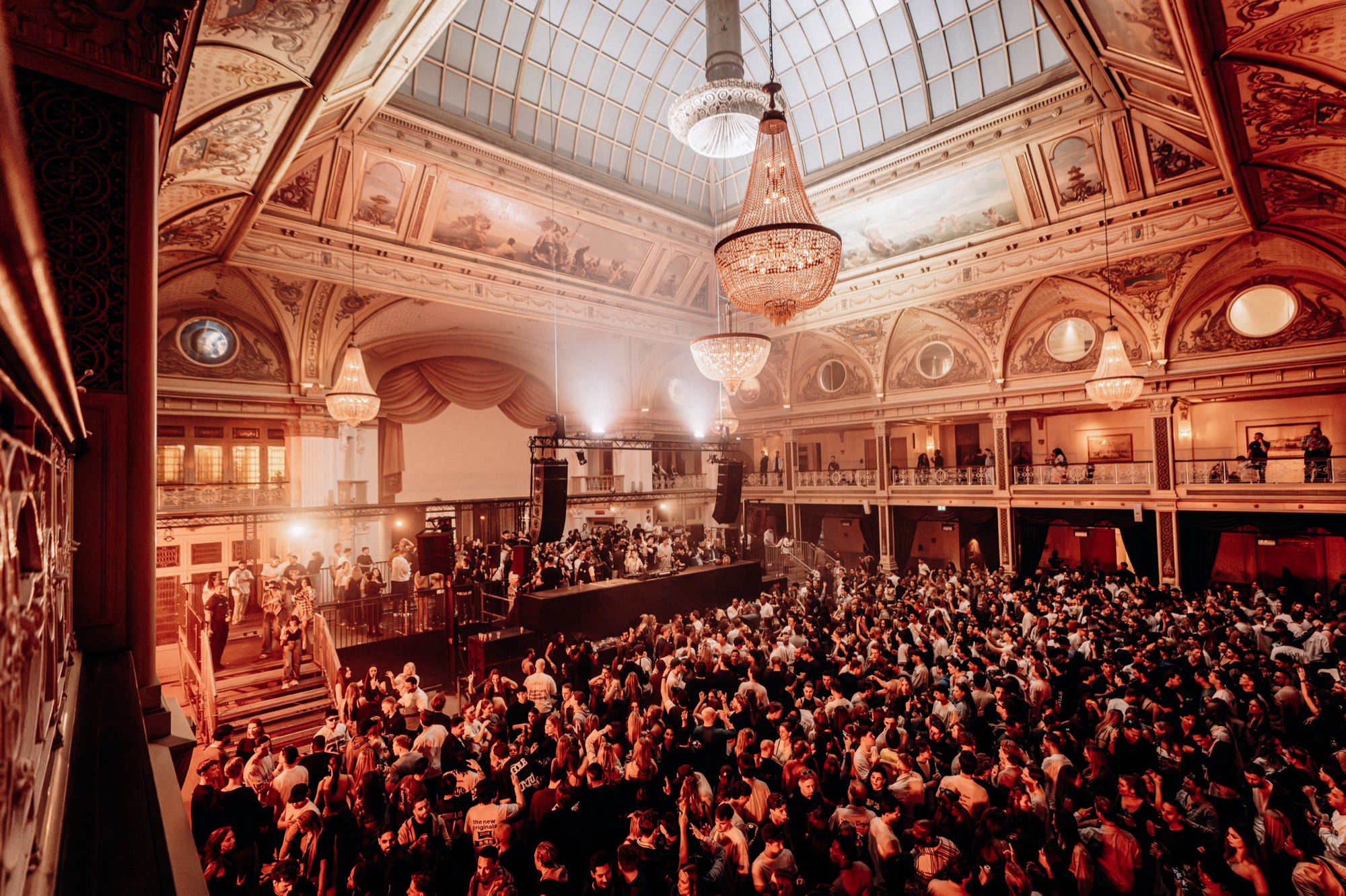 The Kurzaal of the Kurhaus during an Out of the Box night: glass dome, chandeliers and a full floor